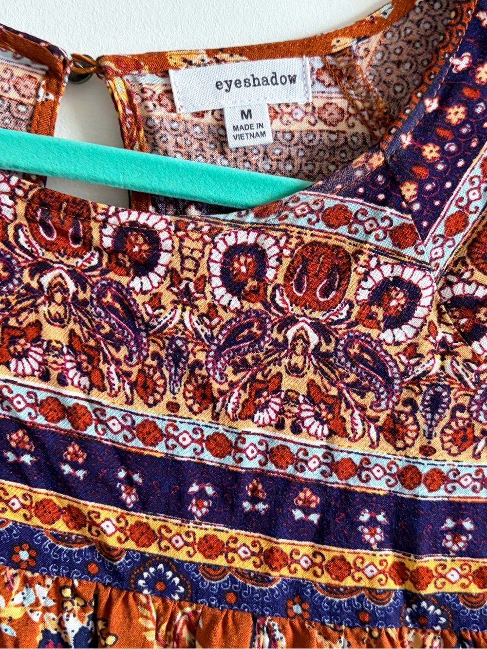 Eyeshadow Burnt Orange Floral Peasant Blouse with Navy Accents - Picture 3 of 5